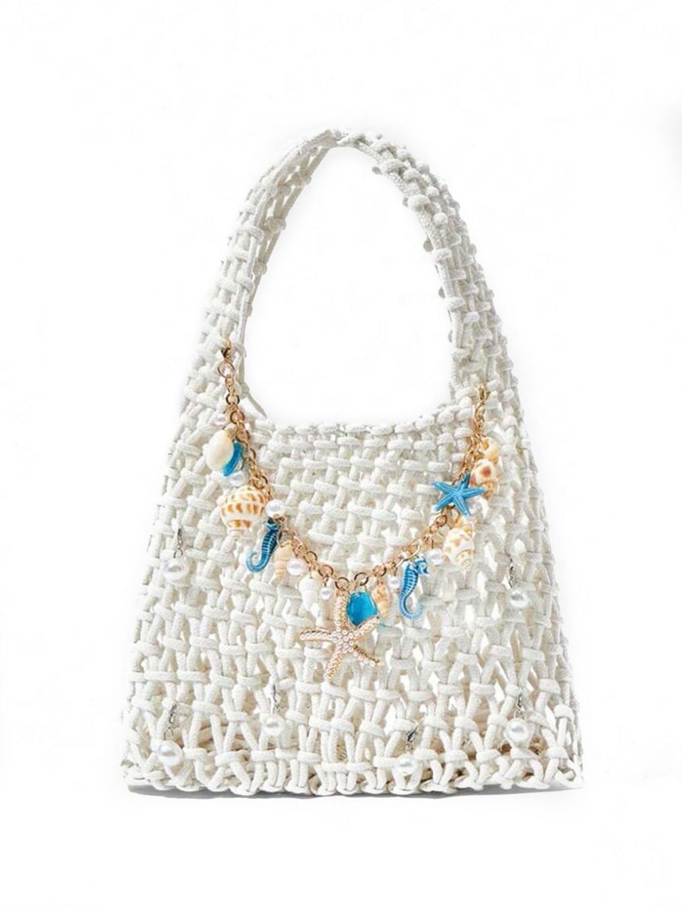 Fresh and artistic style practical texture woven handbag, embellished with starfish, seahorse, shell, pearl, chain, woven long shoulder strap, beige background, suitable for date/vacation dressing scenes