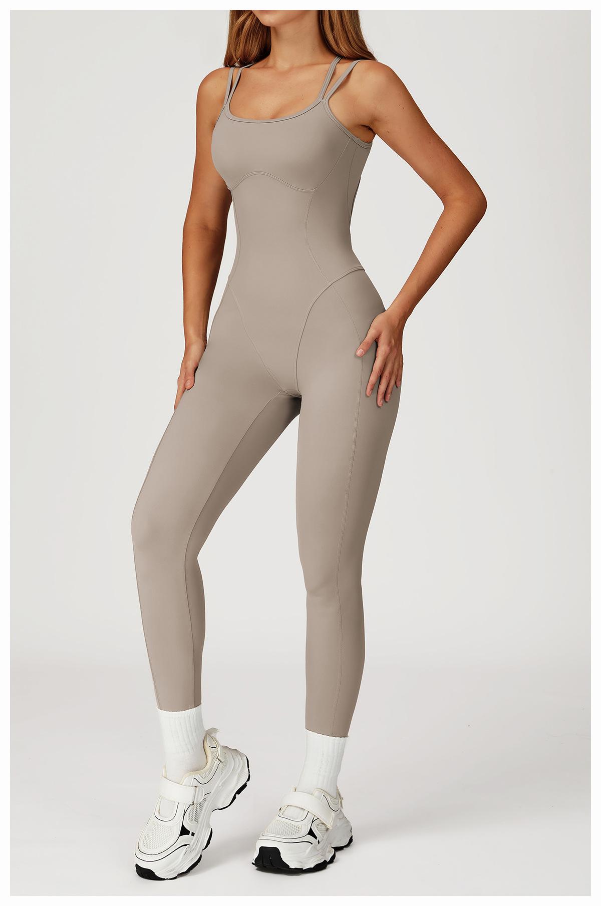 Nude-feel one-piece bodysuit with cross-back design, slim-fit yoga wear for outdoor running and fitness activities