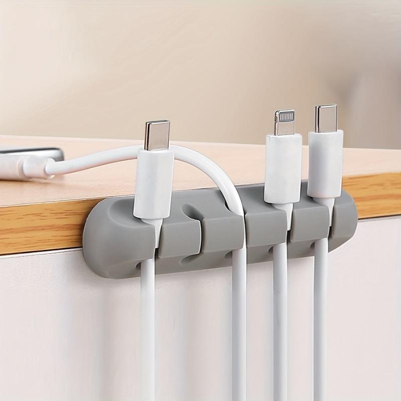 A desktop data cable storage and organization device, a charging desktop cable protector for cable storage and organization, Desk Organizer Tidy