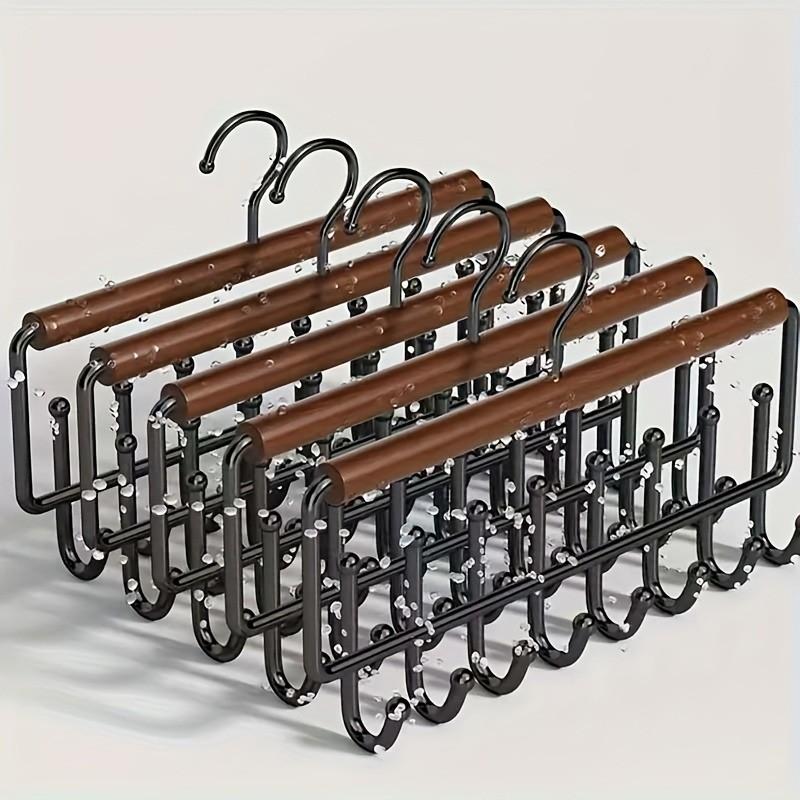 1 Pc Multi-Function Hanger with 8 Hooks – Wave design metal hanger for bras, tank tops, hats and towels. Space-saving closet organizer for bedroom or bathroom storage, durable and practical hanging solution.