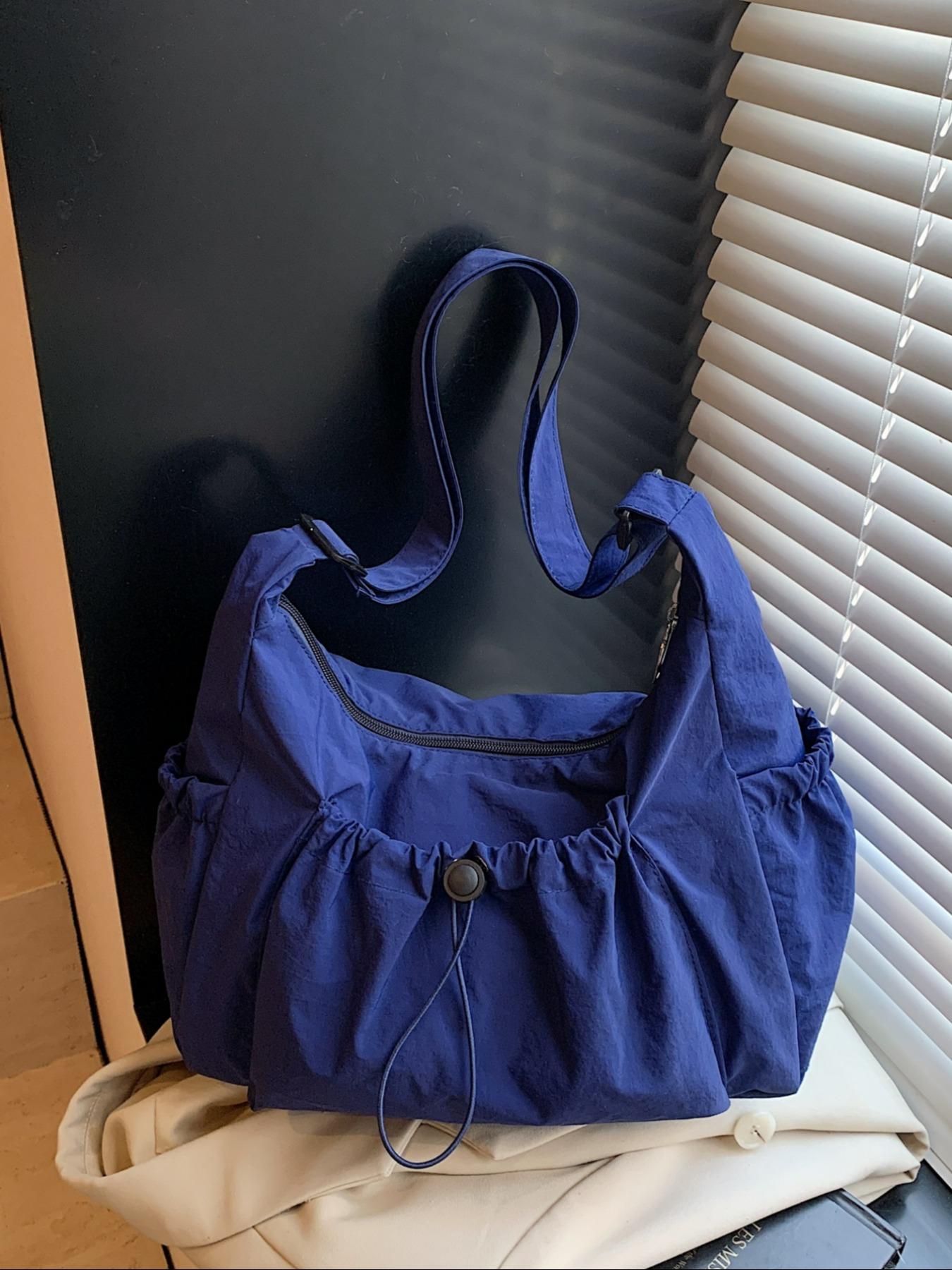 Japanese-style minimalist plaid canvas bag, large capacity, 2025 new autumn/winter casual shoulder/crossbody bag, high-end commuter dumpling bag, zip closure, suitable for campus, workplace, commuting, casual shopping, and everyday accessories.