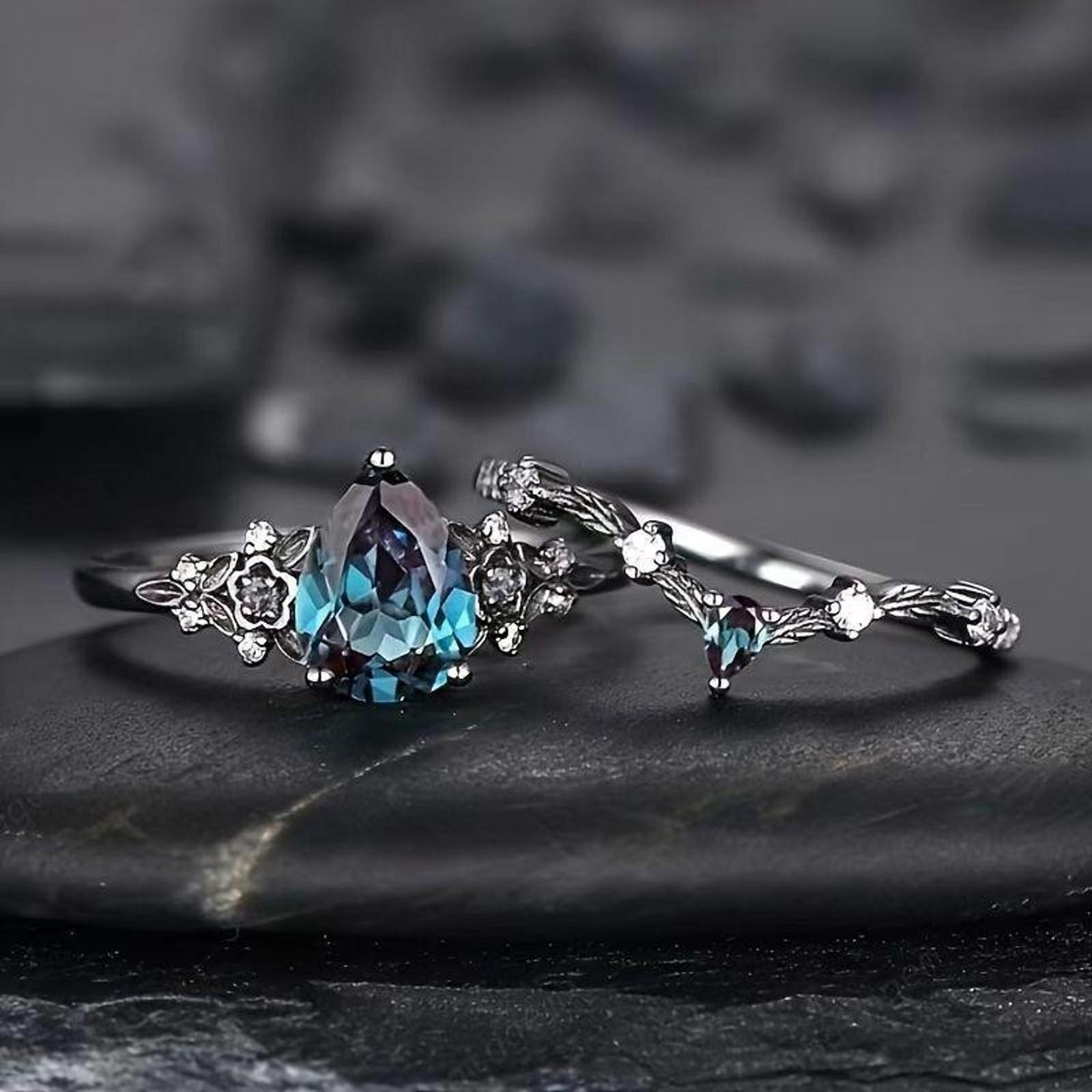 Deluxe sense light luxury personality fashion water drop blue diamond couple ring