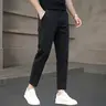 Men's slim-fit cropped trousers, made of a cotton and spandex blend, available in a variety of colors (sizes: 28-38).