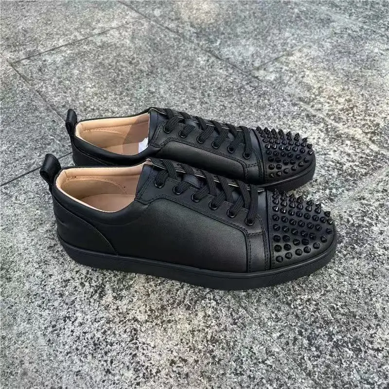 3 black leather studs