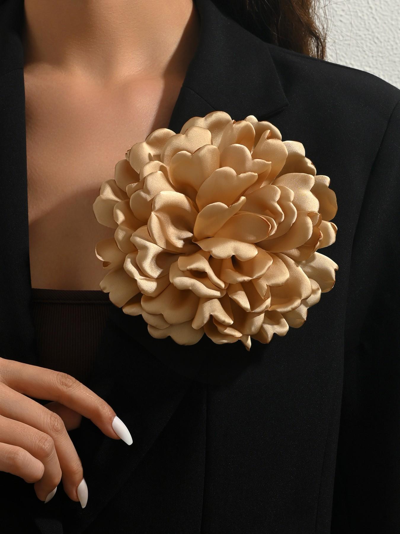 A handcrafted, multi-layered, and multicolored fabric floral brooch featuring a unique, elegant banquet-style design. This versatile corsage—equipped with a convenient duckbill clip—can be worn in various ways and is suitable for any occasion