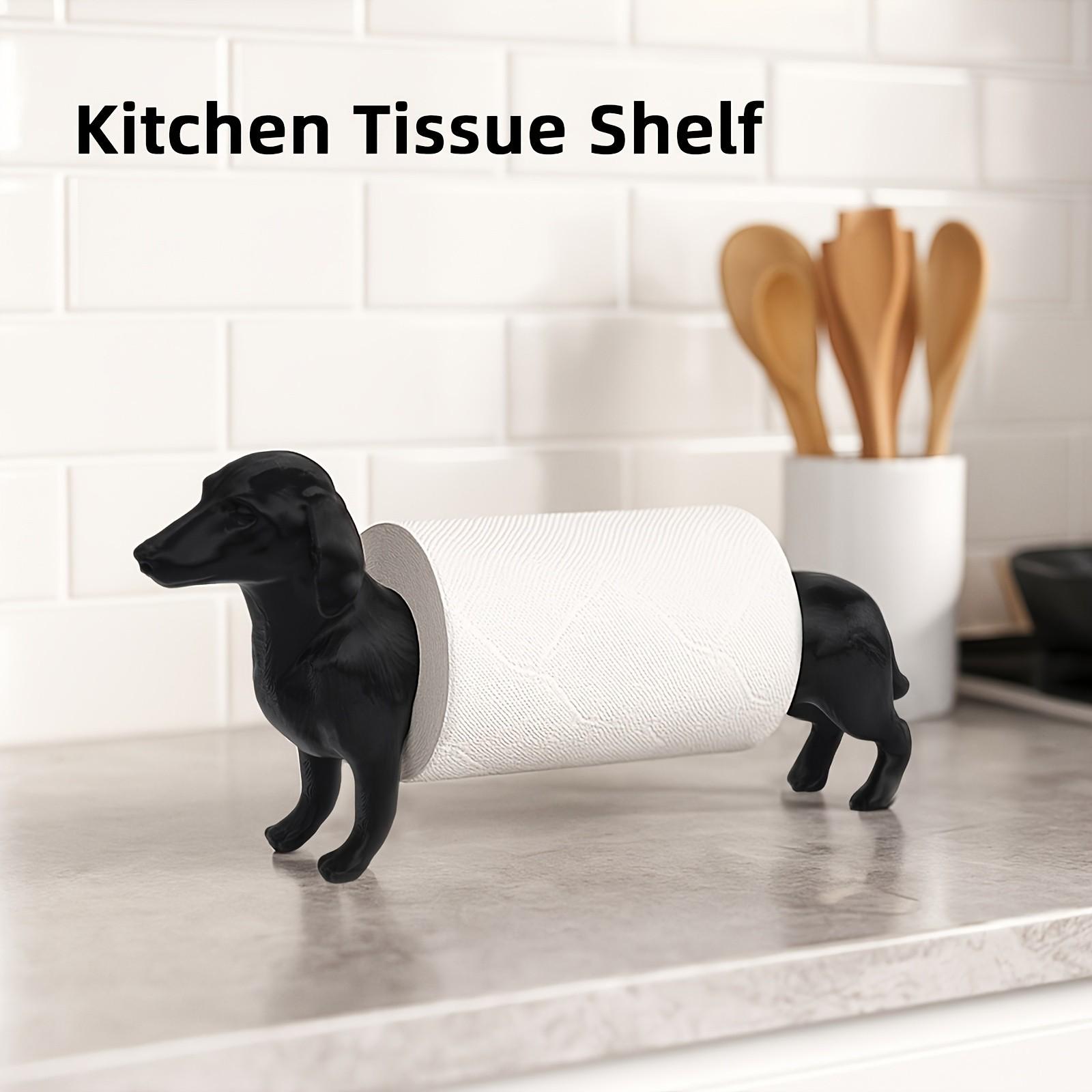 A humorous sausage dog-themed toilet paper holder - an independent black roll holder featuring a cute dog design, made of sturdy plastic and also suitable for kitchen paper towels