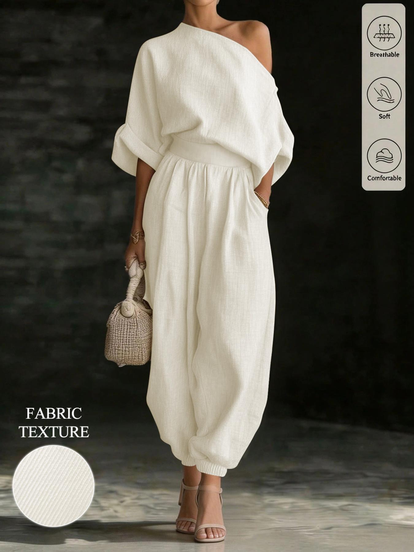 Women's solid color casual asymmetrical neck top paired with elastic waist trousers, a country-style two-piece set, Everyday suitable for daily commuting and all seasons.