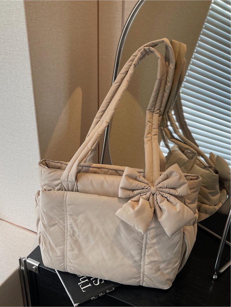 Pink quilted bow tote bag, a gentle, casual, lightweight, and spacious shoulder bag, Casual commuter bag, suitable for commuting, shopping, leisure outings, and everyday accessories.
