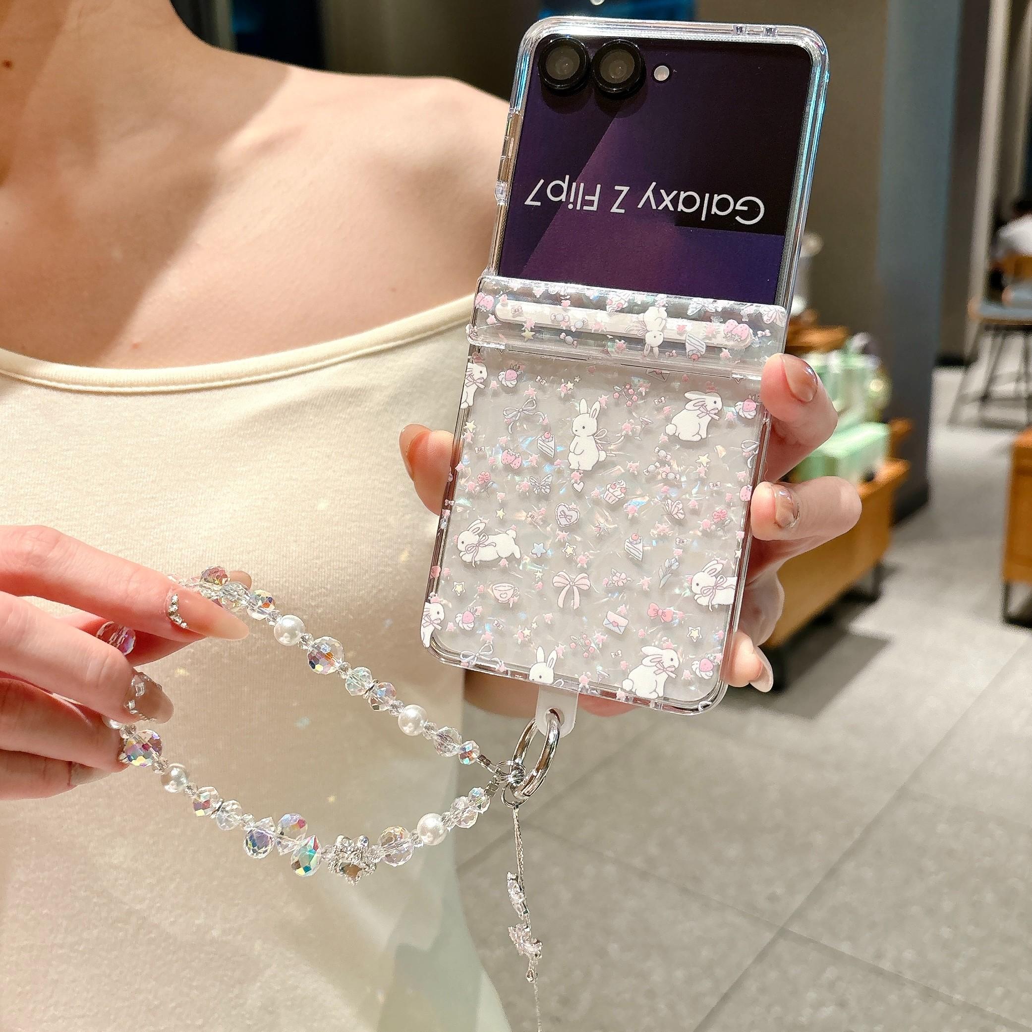 Fresh Floral & Magnetic Snap Shell Pattern Phone Case with optional wrist strap for easy carrying. for Samsung Galaxy Z Flip 5/6/7FE/7. Features a refreshing style, fashionable protection, and unique design perfect for daily use. Protective outer shell.