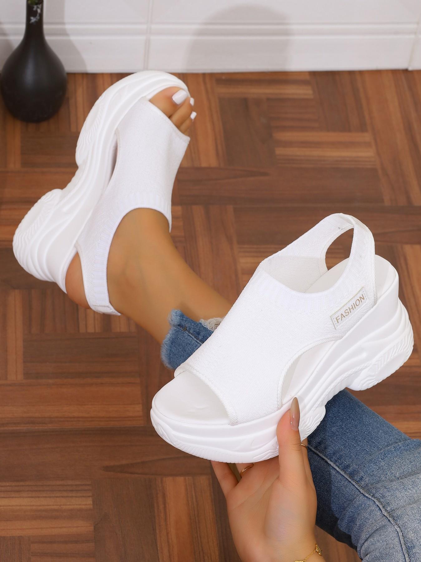 The new women's wedge heel sandals for the summer of 2026, with thick soles and high heels, are fashionable and stylish with a sponge sole. The fusion of fashion and comfort makes you the focus of summer. Fashionable Heeled Sandals