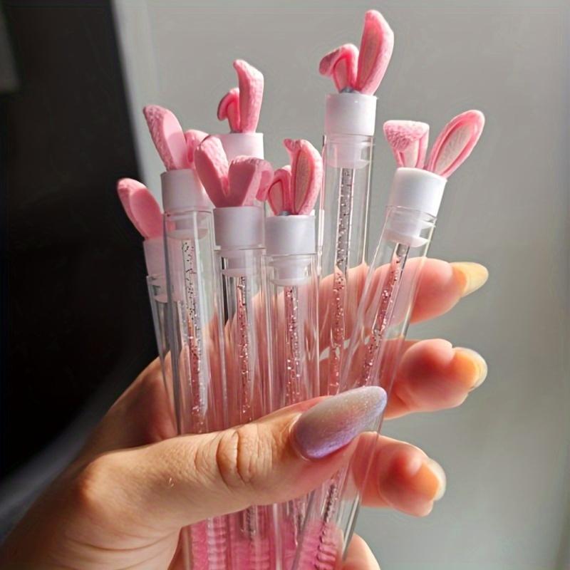 30-piece pink makeup brush set, including a 5-piece eyelash brush tube set and 25 eyelash brushes for eyebrows and lashes