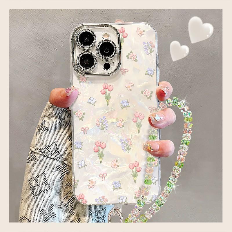 Cute Floral Phone Case with Wrist Strap for iPhone 17 /Pro Max, Acrylic Aesthetic Shockproof Cover with Bling Camera Lens Protector, Clear Glitter Flower Case for Women Girls