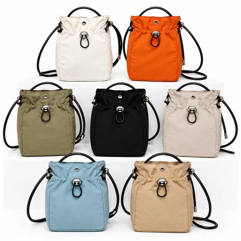 Effortless Style Mini Drawstring Bucket Bag Soft Fabric Crossbody Pouch Lightweight For Daily Essentials On The Go Casual Use