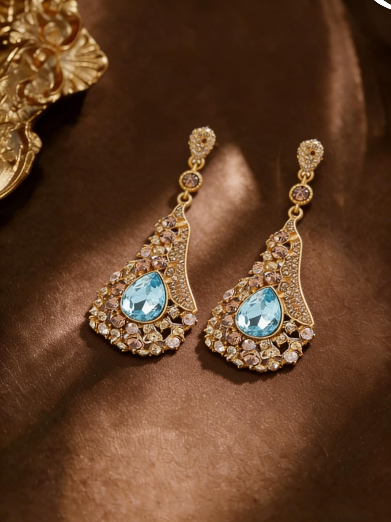 A pair of vintage noble teardrop shaped sapphire pendant earrings, suitable for daily wear, vacation dates, and other occasions, and also a surprising and exquisite small gift.