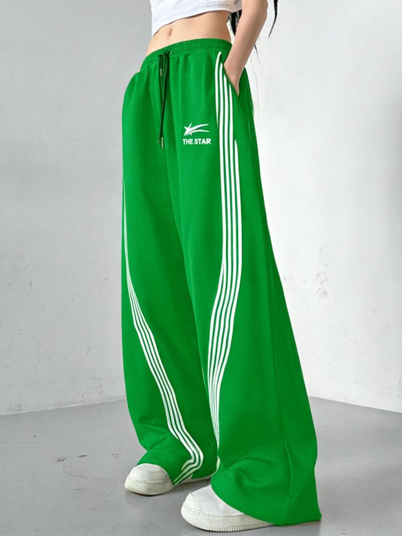Women's Wide-Leg Track Pants, elastic drawstring waist with contrast side stripes and "THE STAR" logo print, relaxed fit for streetwear, dance and casual daily wear, available in multiple colors