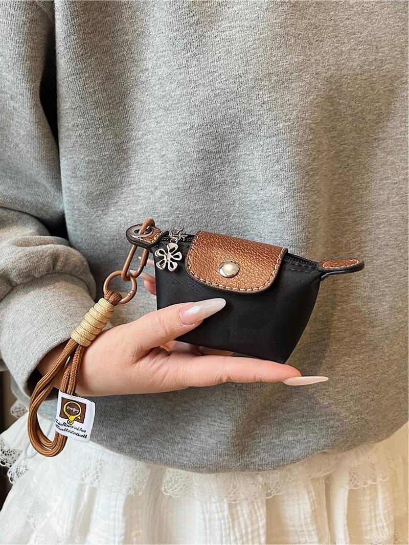 Mini women's flip button casual and compact handbag, wrist pocket, multiple colors to choose from, suitable for daily clothing matching, fashionable for going out.