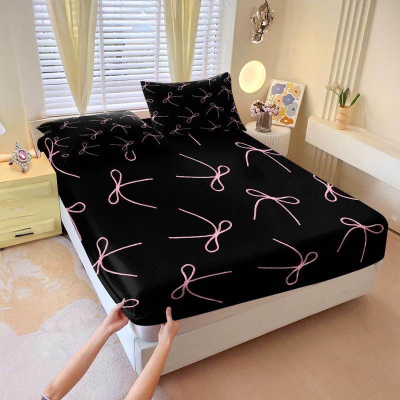 3-piece Bedding Set Features A Black Background With Pink Bow And Heart Prints, Including A Fitted Sheet And Two Unfilled Pillowcases. The Design Blends Two Elements, Creating A Romantic And Sweet Yet Cool Bedroom Décor, Gift Choice, Bed Sheet Sets