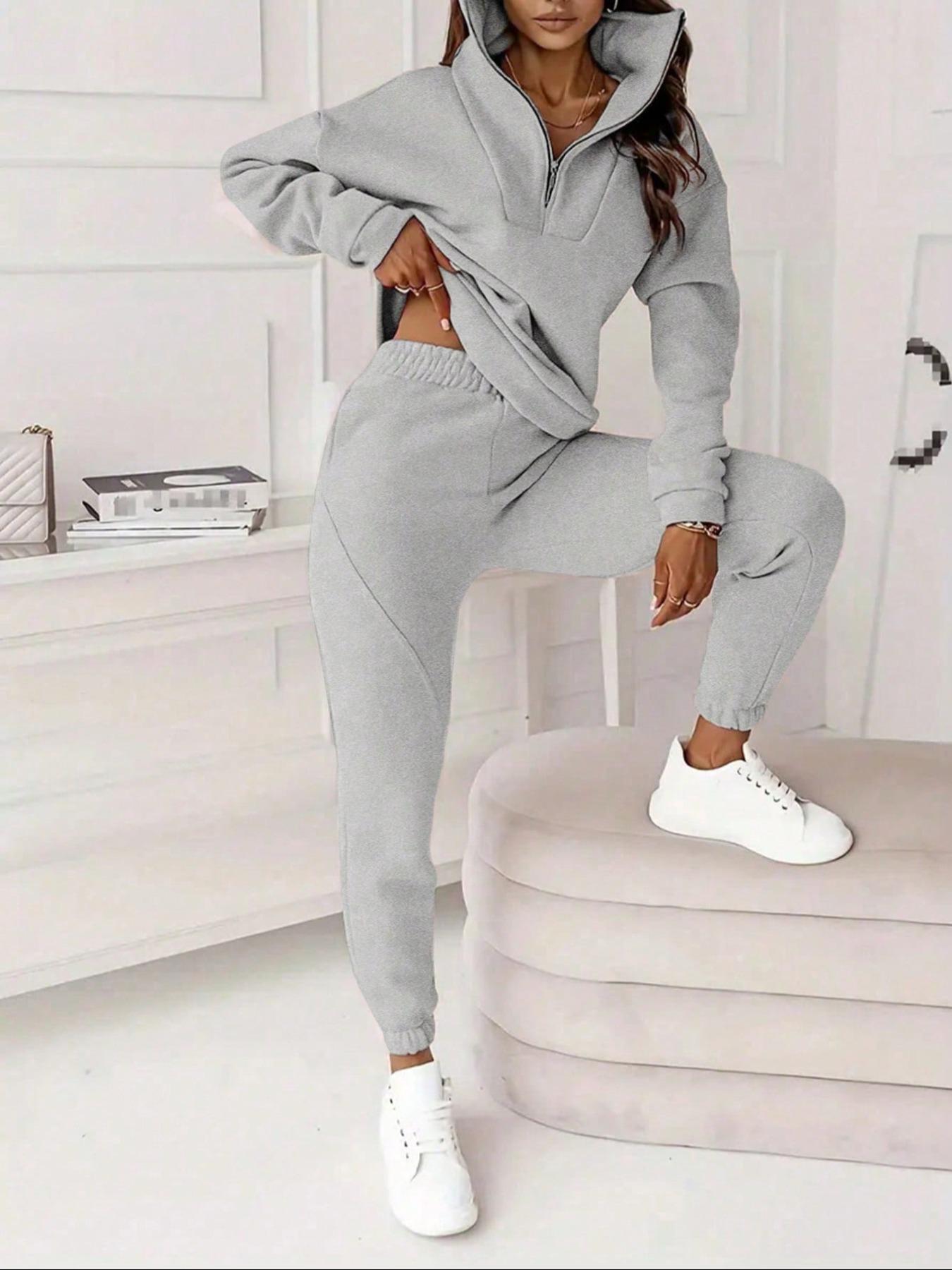 Two-piece women's solid-color crew-neck pullover with long sleeves and elastic waist and loose-fitting bottom pants, perfect for all occasions and versatile in style.
