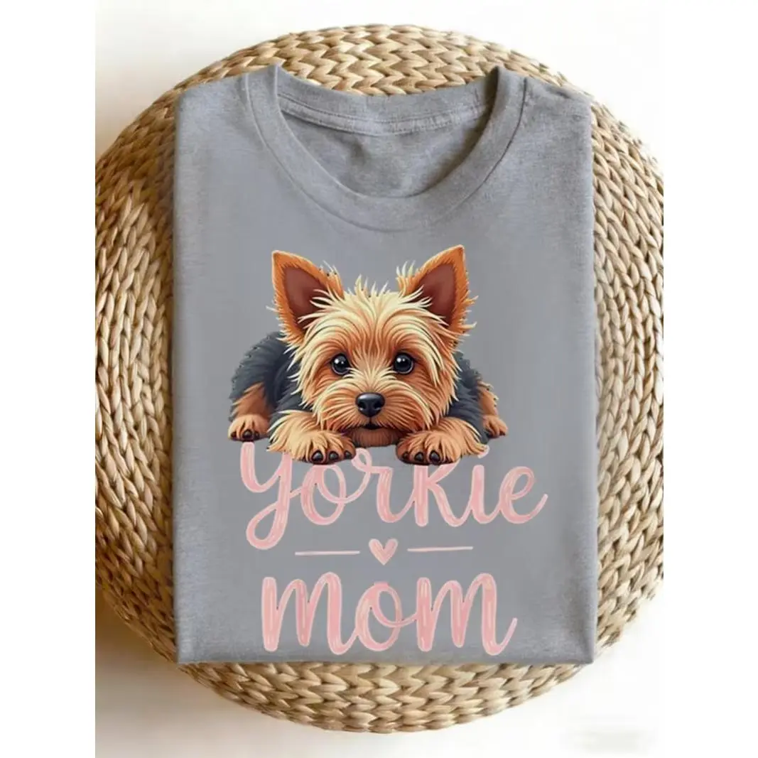 Yorkie Mom Puppy Peek Graphic Tee – Tee With Adorable Printed Fluffy Yorkshire Terrier Peeking Over Pink Cursive Text, Pet Parent Pride Aesthetic, 100% Cotton, Ideal Gift For Dog Moms & Small Breed Enthusiasts, Best Park Walk, Coffee Date & Cute Casual Ou