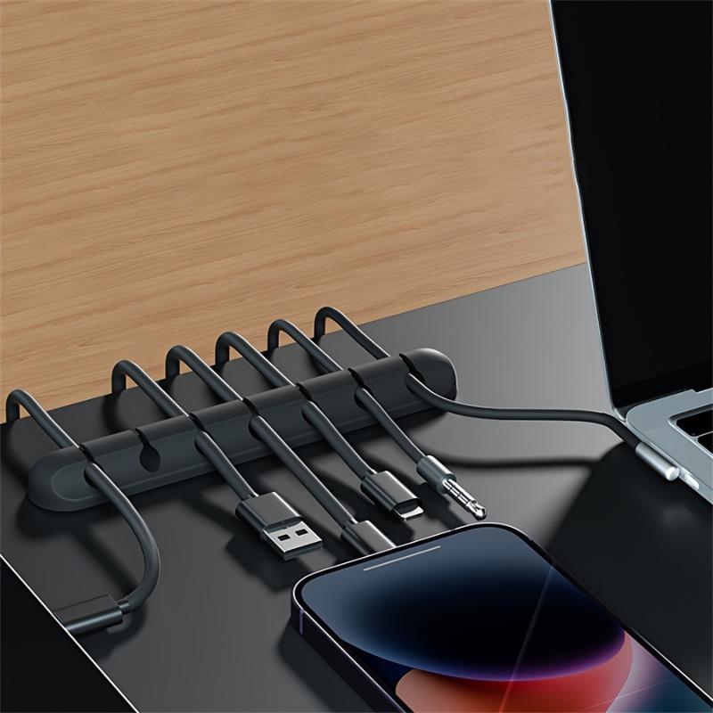 A desktop data cable storage and organization device, a charging desktop cable protector for cable storage and organization, Desk Organizer Tidy