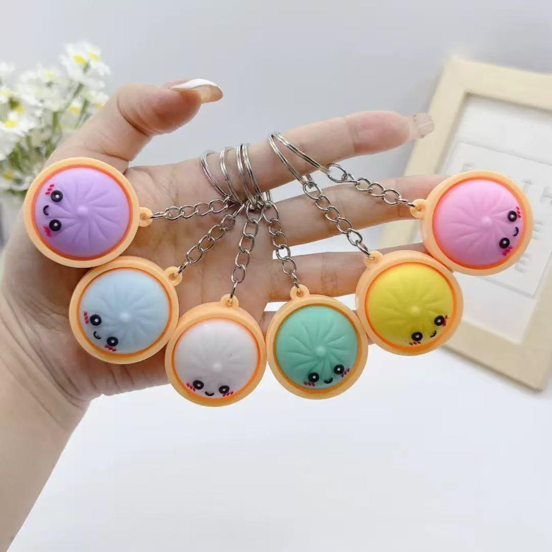 24pcs Glowing Cute Dumpling Press Keychain, PVC Food Shape Pendant, Durable Stress Relief Toy, Ideal for Daily Use, Parties, Gifts, Keychain Kawaii