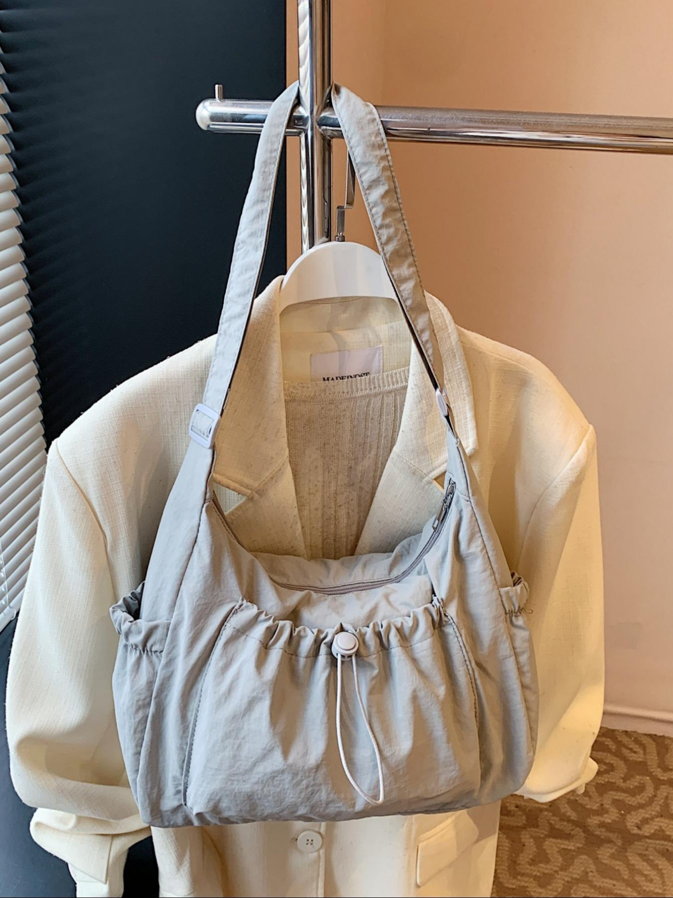 Japanese-style minimalist plaid canvas bag, large capacity, 2025 new autumn/winter casual shoulder/crossbody bag, high-end commuter dumpling bag, zip closure, suitable for campus, workplace, commuting, casual shopping, and everyday accessories.