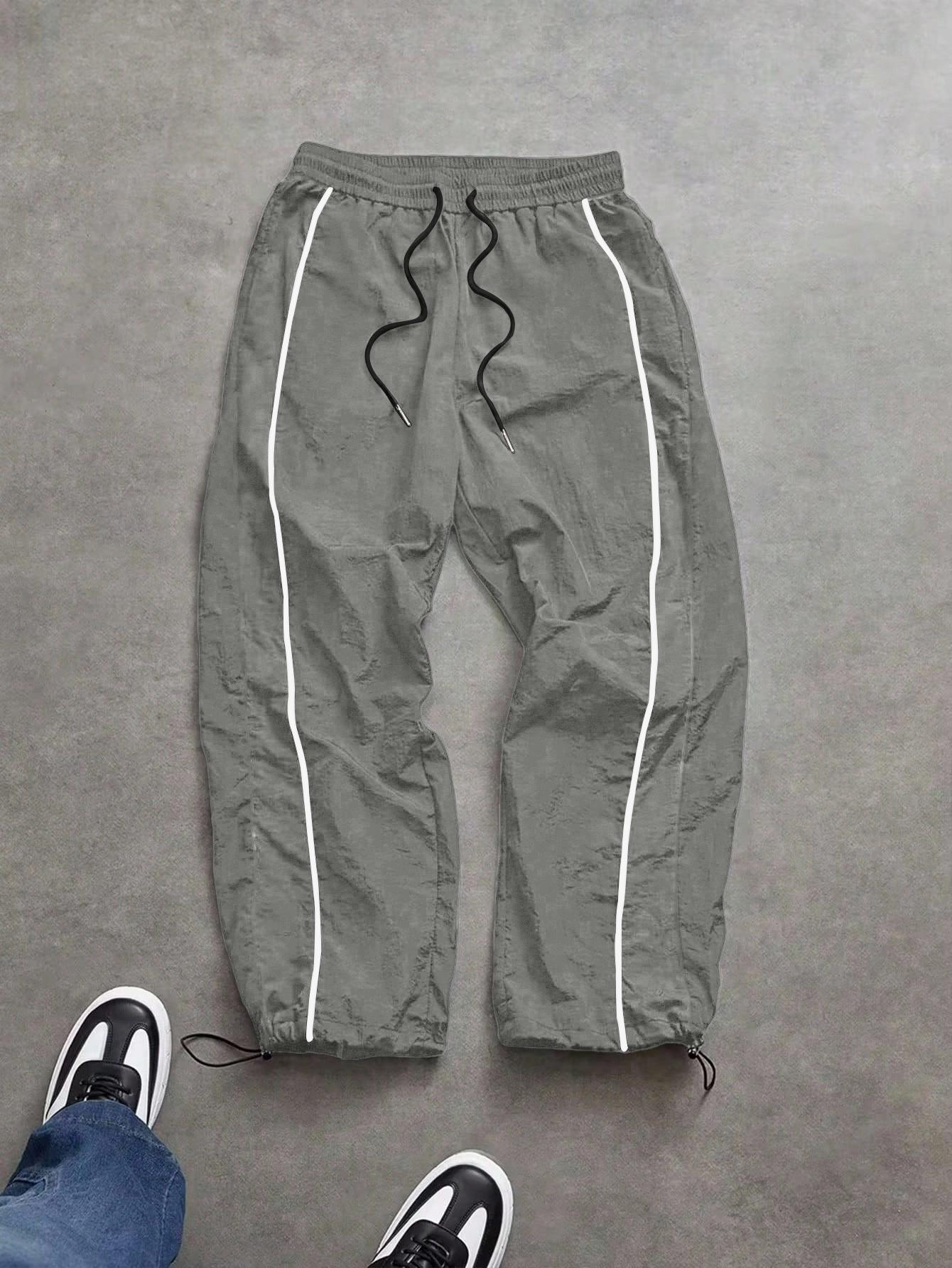 Men's lightweight, breathable, reflective printed wide-leg pants with adjustable leg openings and drawstrings, elastic waist, casual pants suitable for outdoor sports, fitness, campus commuting, street fashion, and versatile long pants