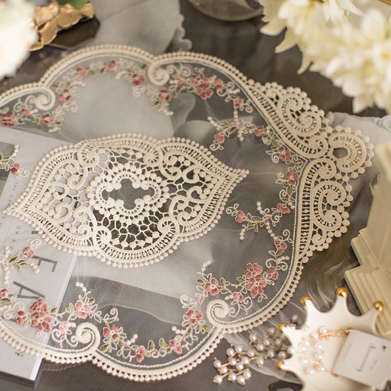 1 piece, a vintage-style handmade crochet round mat with polyester fabric, featuring elegant hollow designs and floral motifs, suitable for weddings, dining utensils, parties, Valentine's Day, Easter, St. Patrick's Day, and carnival celebrations.