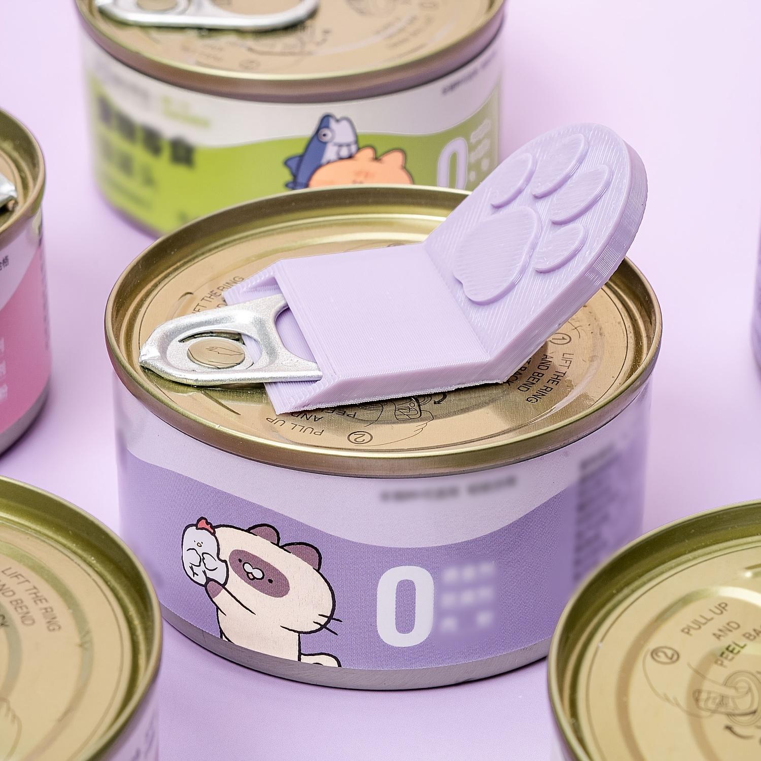 A Pet Can Opener with an Ergonomic Non-Slip Handle, Suitable for Cat/Dog Food Cans, Made of Durable Plastic, Featuring an Easy-To-Clean Design