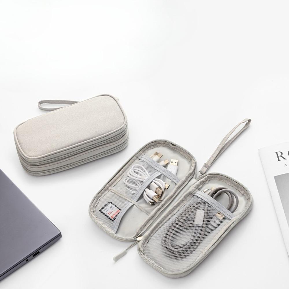 Portable data cable storage bag, double-layer mobile phone charger storage bag, multi-layer grid digital accessory storage bag, compact and convenient travel data cable storage bag