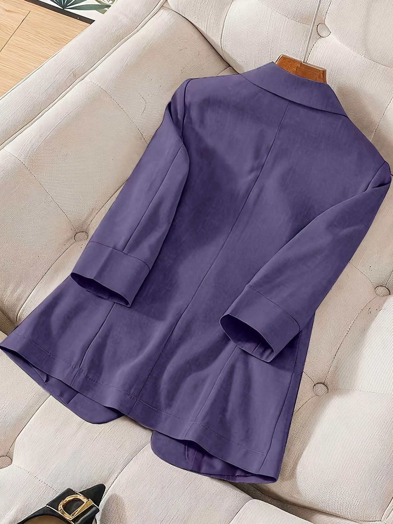 A women's solid color lapel single-breasted single-button mid-length sleeve double-pocket stylish blazer, suitable for spring and summer, appropriate for the workplace and daily wear.