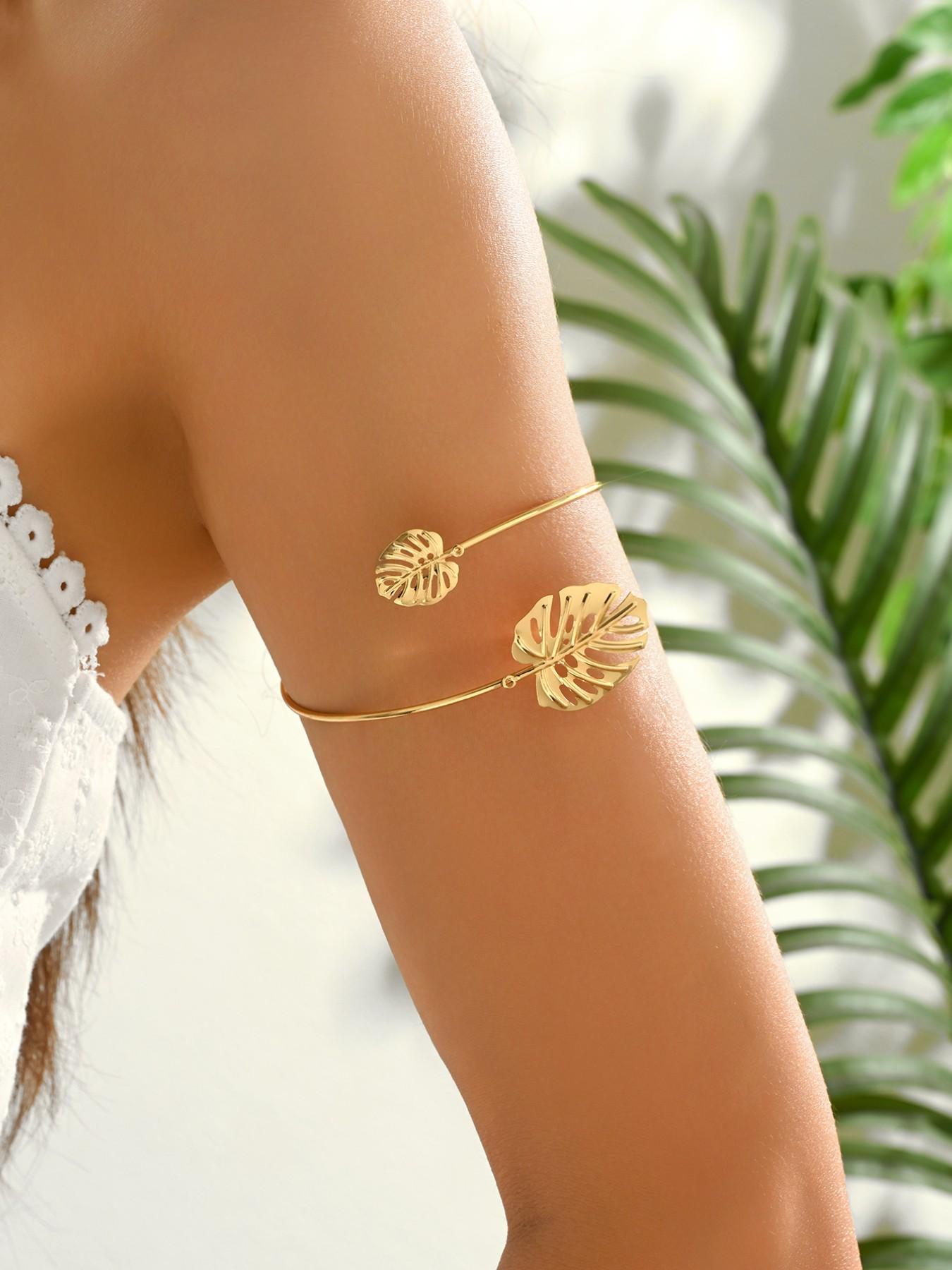A bohemian-style, fashionable, vacation-inspired, delicately carved leaf-shaped adjustable bracelet/armband. A perfect gift for your loved one, mother, or best friend. Ideal for Valentine's Day, Mother's Day, Women's Day, or Thanksgiving.