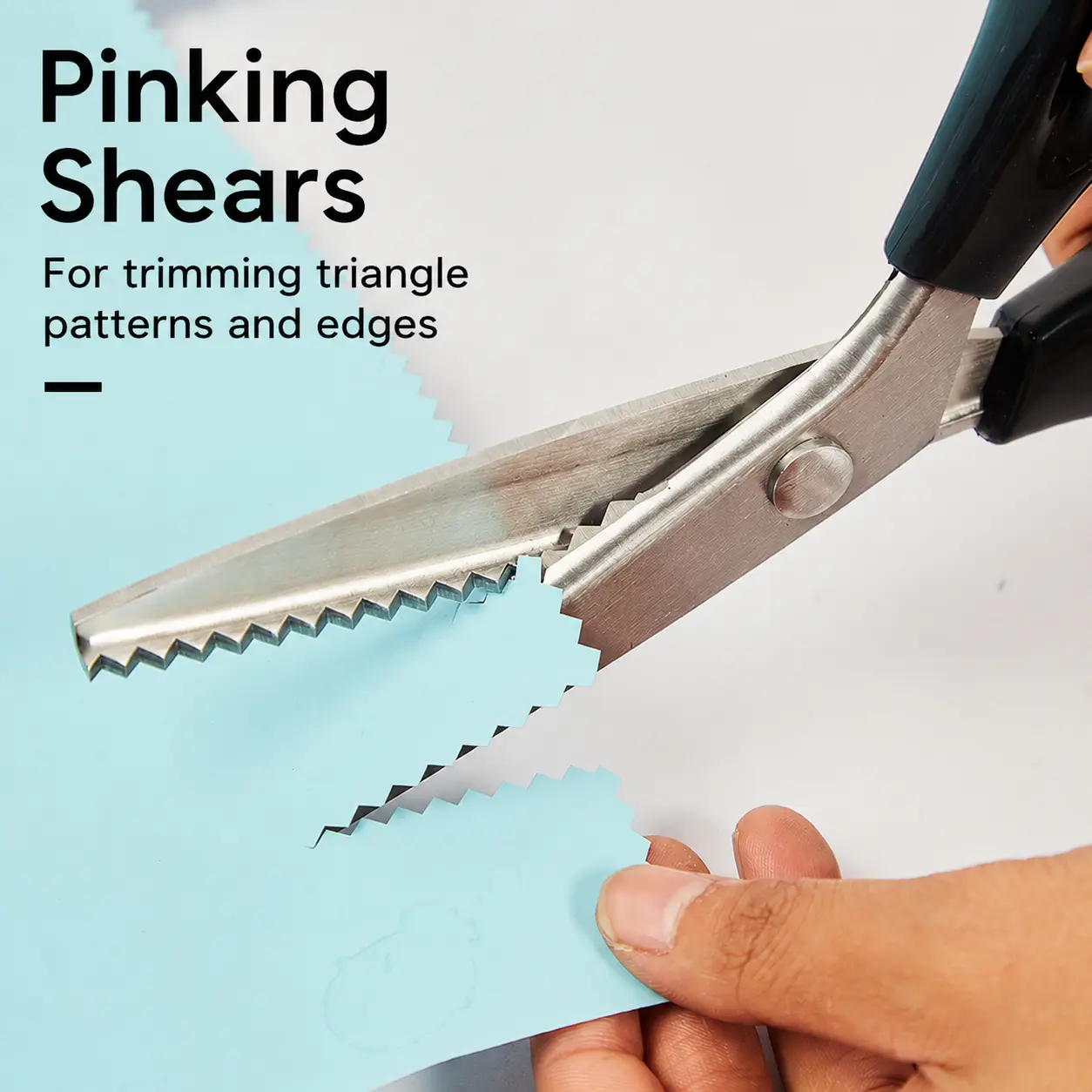Professional Stainless Steel Pinking Shears – Heavy-duty fabric and craft scissors with an ergonomic design, suitable for cutting decorative edges in sewing projects.