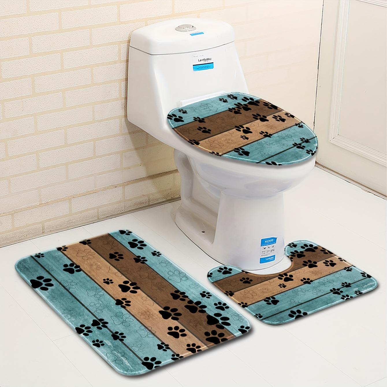 A Set of Three Cartoon Wooden Board Patterned Dog Paw Print Bathroom Toilet Additions, Including a Rectangular Mat, a U-Shaped Foot Pad, And an Oval Toilet Lid Cover. This Combination Set Features Soft And Comfortable Flannel Fabric with Super Absor