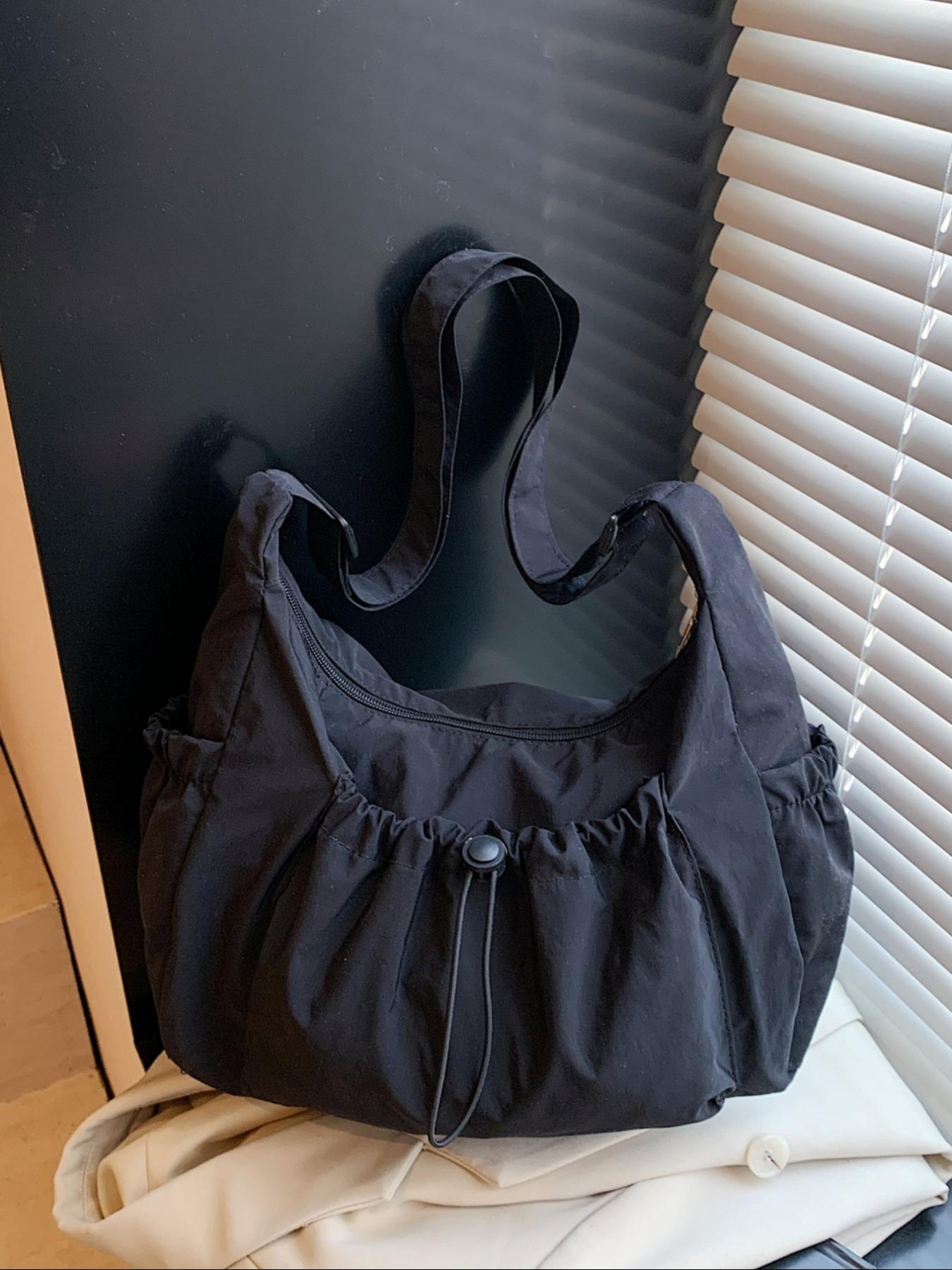 Japanese-style minimalist plaid canvas bag, large capacity, 2025 new autumn/winter casual shoulder/crossbody bag, high-end commuter dumpling bag, zip closure, suitable for campus, workplace, commuting, casual shopping, and everyday accessories.