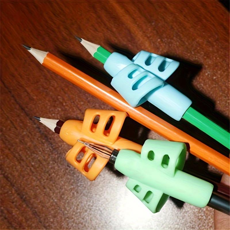 4pcs Multi-color Pencil Holder for Primary School Students Children's Stationery Soft Glue Writing Posture Corrector Pen Holder for Writing Posture Correction Office Supplies Classroom Supplies Desk Supplies