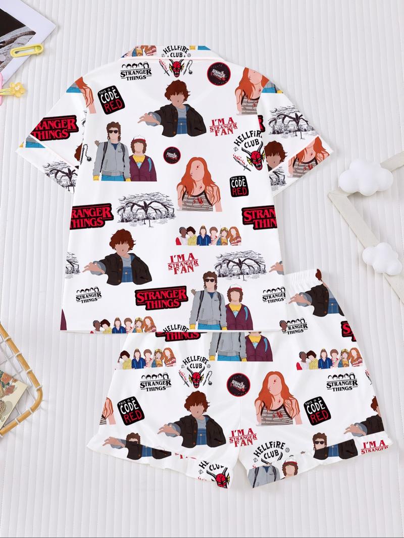 Stranger Things Cartoon Print Pajama Set for Kids - Summer Short Sleeve Cartoon Print Home Wear 2-Piece Set for Boys and Girls, New Flame-Retardant Turn-Down Collar Shirt and Loose Elastic Waist Ruffled Shorts Set. The pajamas feature iconic character pri