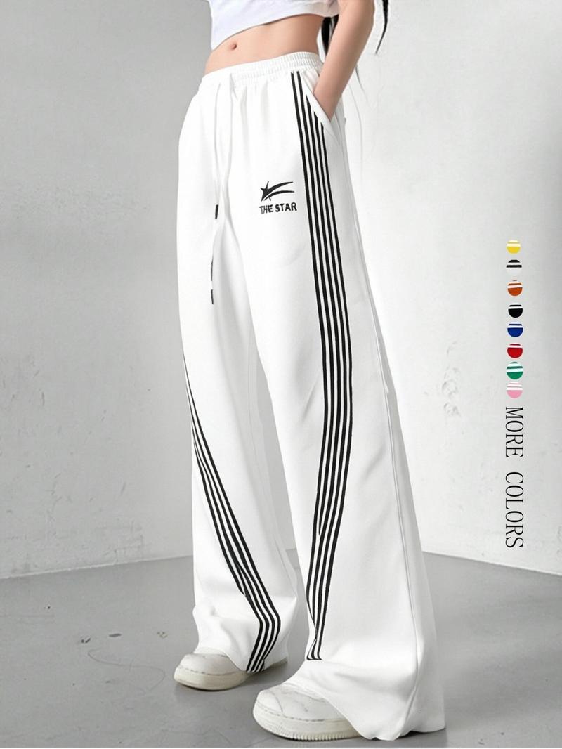 Women's Wide-Leg Track Pants, elastic drawstring waist with contrast side stripes and "THE STAR" logo print, relaxed fit for streetwear, dance and casual daily wear, available in multiple colors