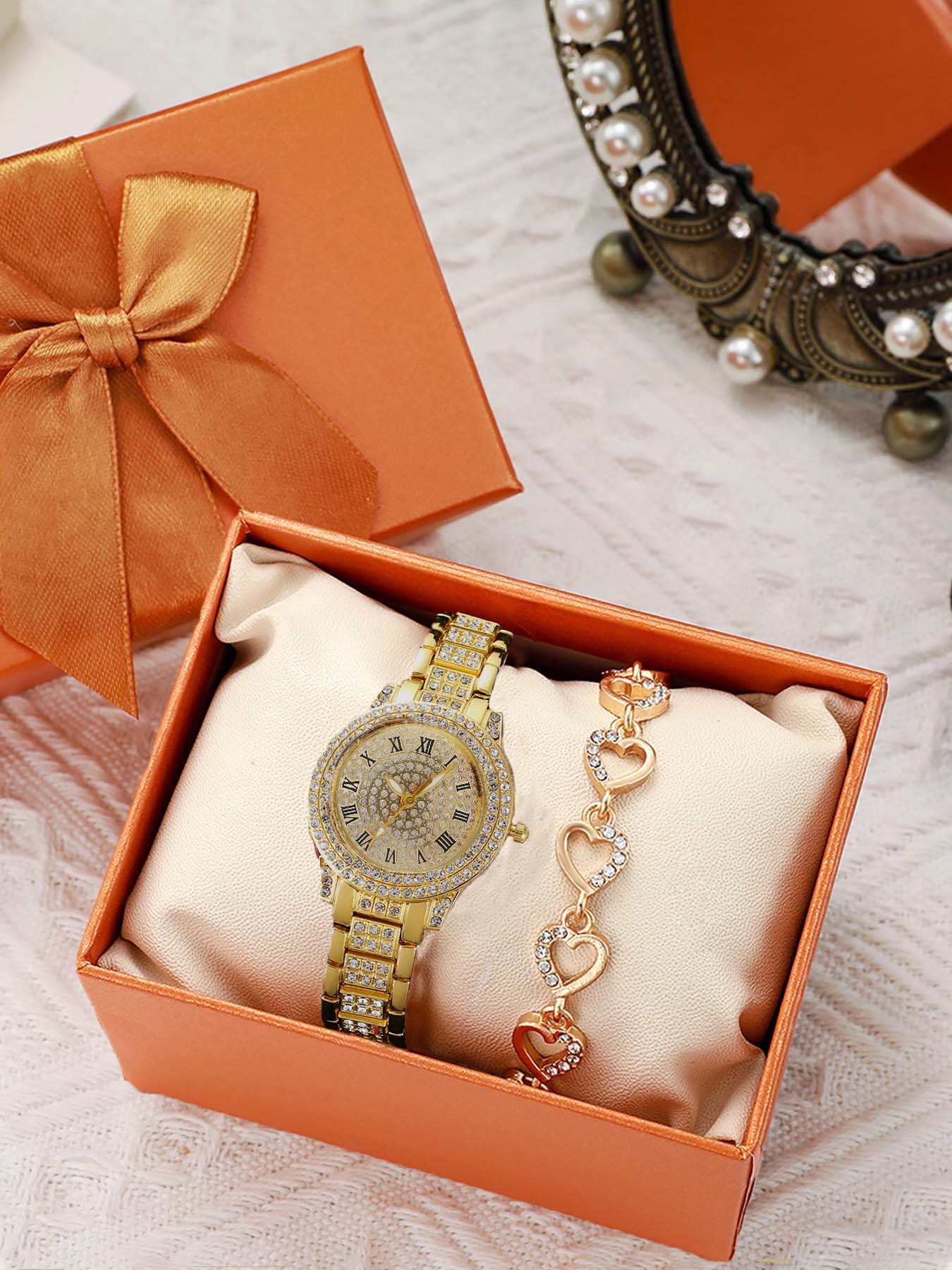 2-piece set of ladies' diamond-encrusted Roman numeral watch and bracelet