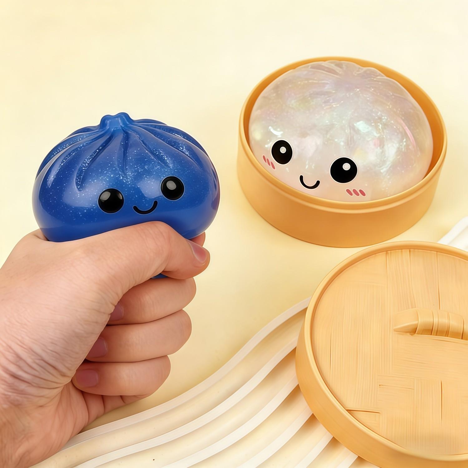 Brand-New Glitter Dumpling Squeeze Toy — A sparkling, dumpling-shaped stress-relief toy that bears a striking resemblance to a realistic steamed bun.