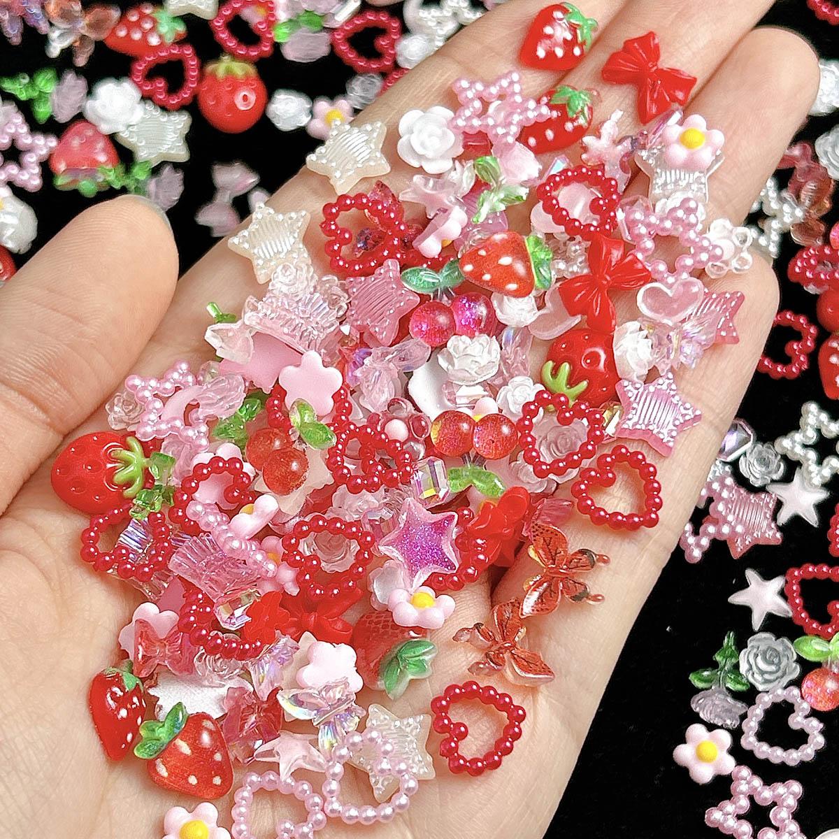 100PCS 3D Creative Strawberry Bow Cherry Resin Nail Charms Simulated Pearl Heart Transparent Camellia Butterfly Rose Decorations for Women DIY Phone Case Nail Art Supplies