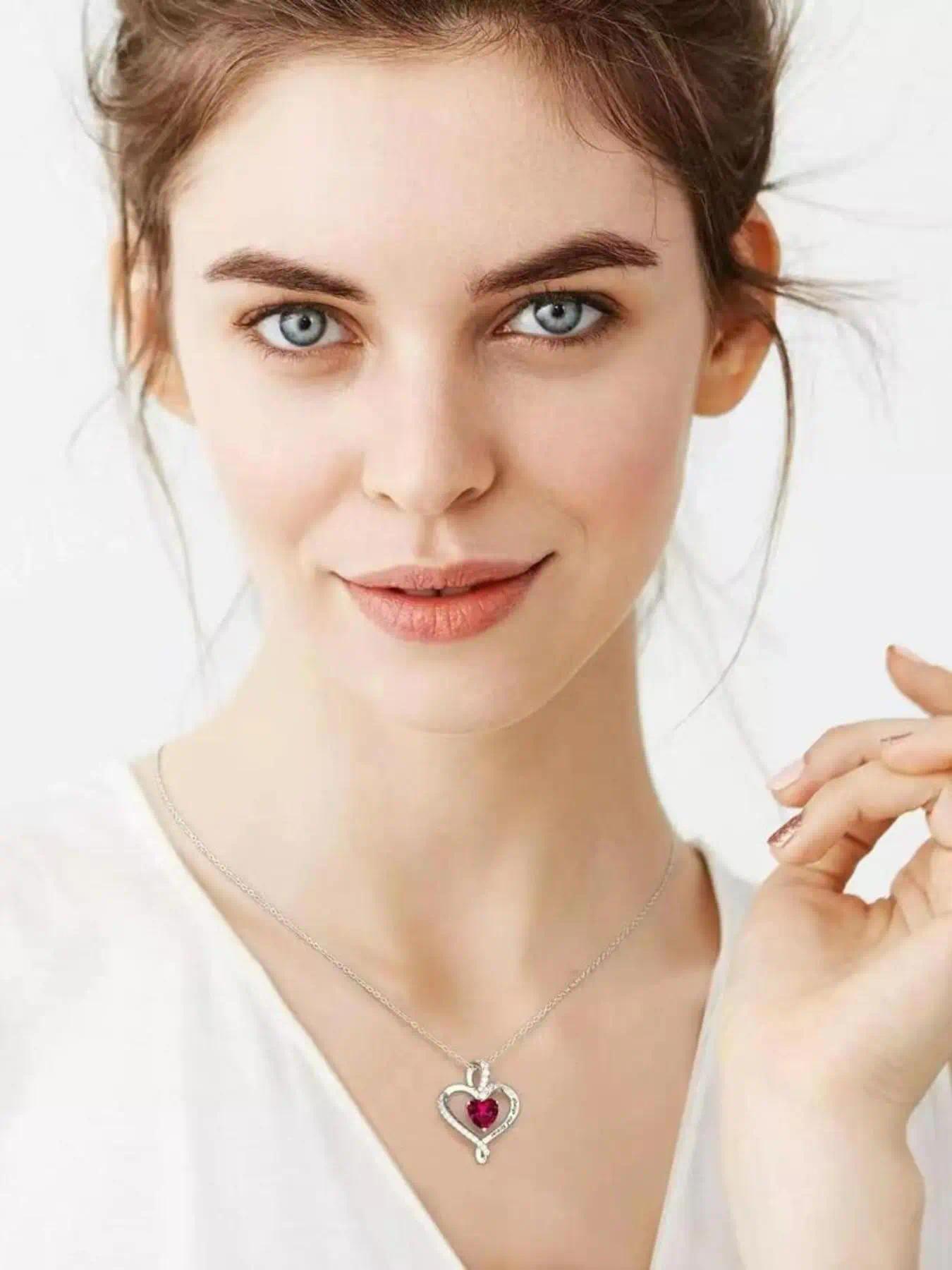 A romantic teddy bear necklace with a birthstone rotating pendant and heart design, perfect for women. It's the perfect gift for Valentine's Day, weddings, Mother's Day, anniversaries, birthdays, and Christmas.