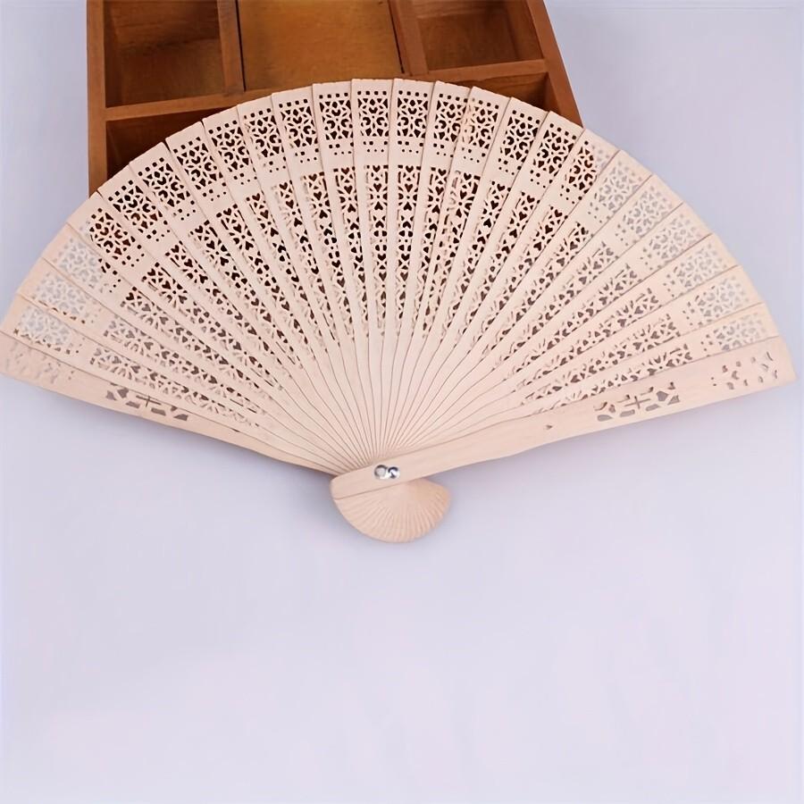 1PC Fashion Wooden Folding Fan – Hollow Carved Bamboo Hand Fan, Bohemian Style, Lightweight Portable Photography Prop, Perfect Graduation Gift for Women & Home Decor Accessory