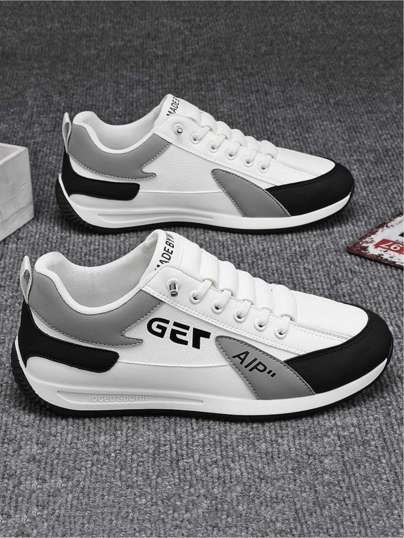 Men's casual sports shoes, simple splicing design for breathability and comfort, contrasting tongue and eye-catching letter logo for fashionable embellishment, ideal for light commuting and sports wear