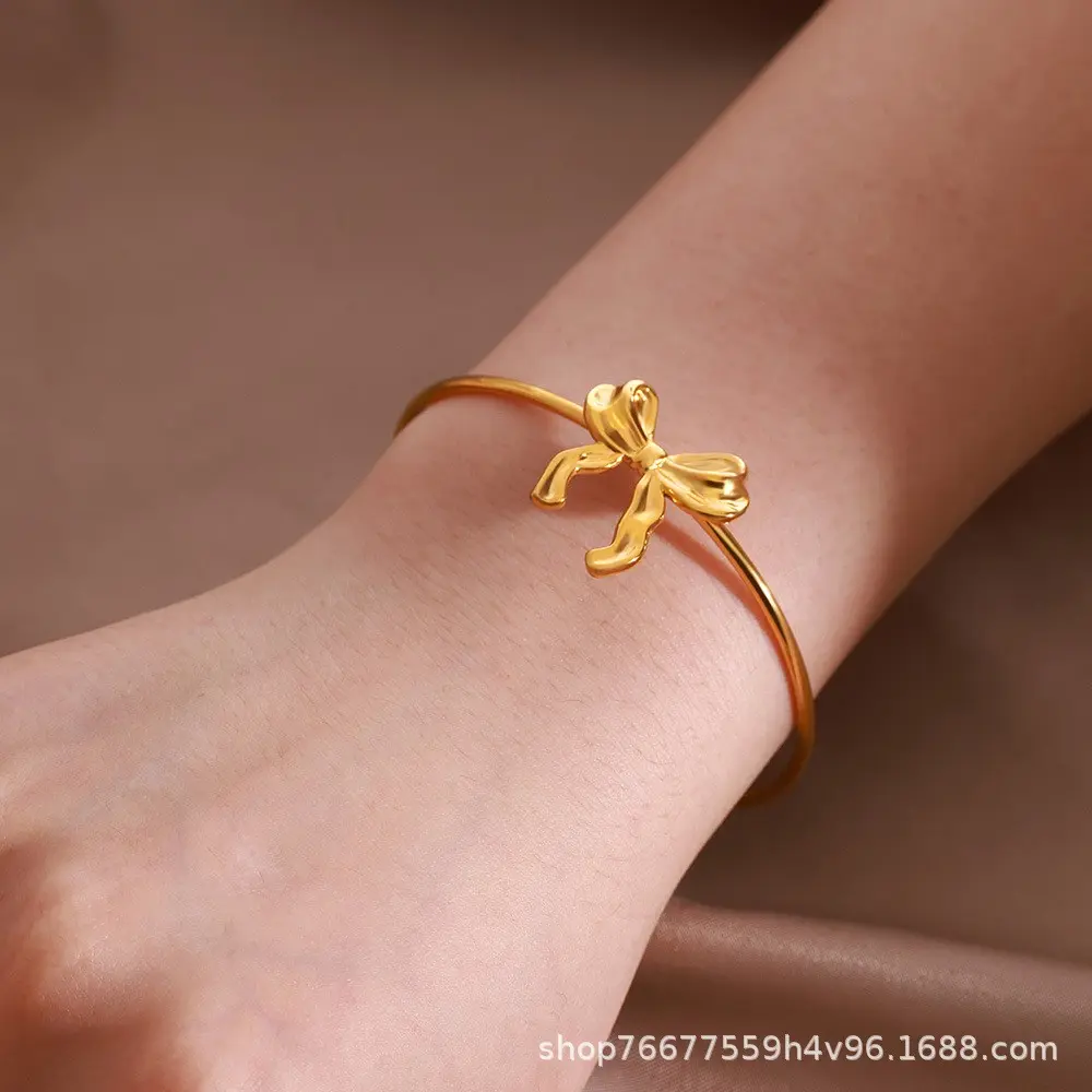 Golden bow bracelet