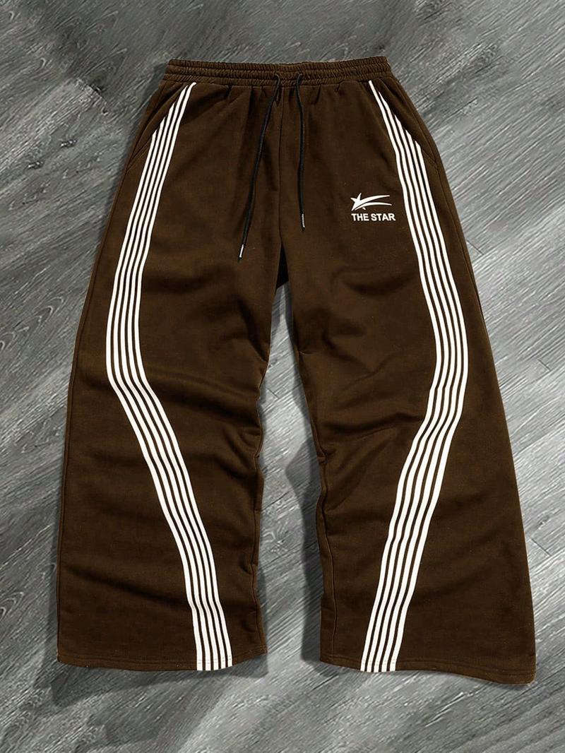 Women's Wide-Leg Track Pants, elastic drawstring waist with contrast side stripes and "THE STAR" logo print, relaxed fit for streetwear, dance and casual daily wear, available in multiple colors
