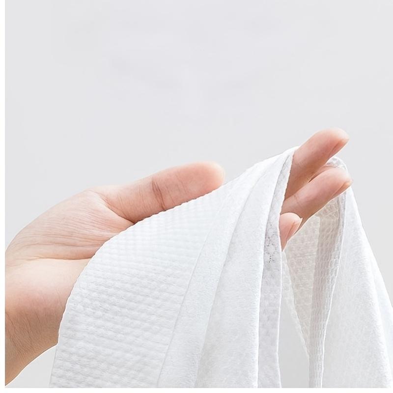 Disposable compressed towels and bath towels for travel! Extra large and thick, super absorbent, individually packaged, portable and hygienic! (Model: DM662)