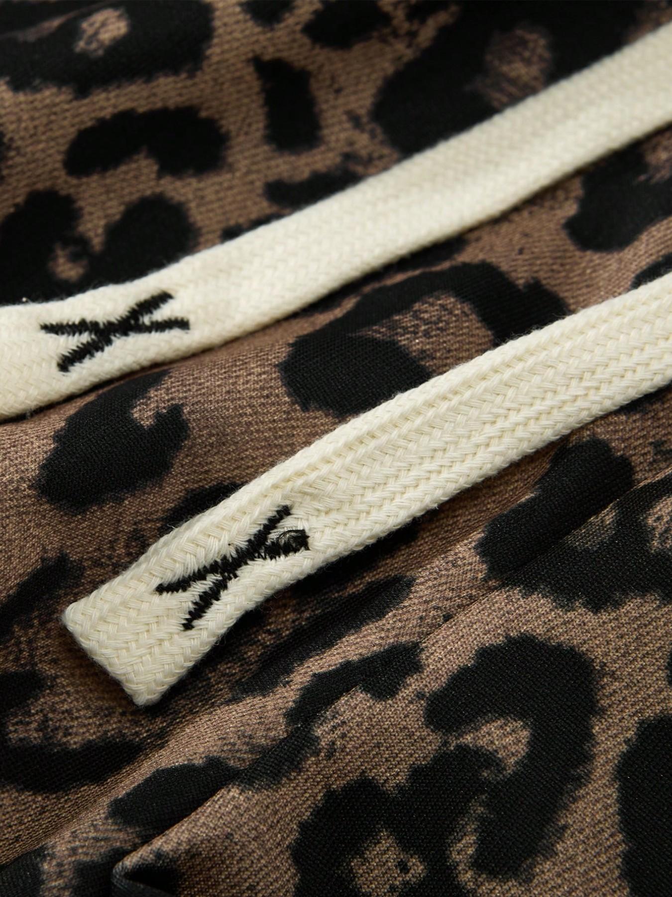 Y2K Leopard Print Track Pants with White Stripes, Streetwear Baggy Sweatpants for Men/Women, Elastic Waist Drawstring Casual Trousers, Retro 90s Hip Hop Fashion, Loose Fit Joggers for Street Style, TikTok Viral Aesthetic, Comfortable Soft Fabric,