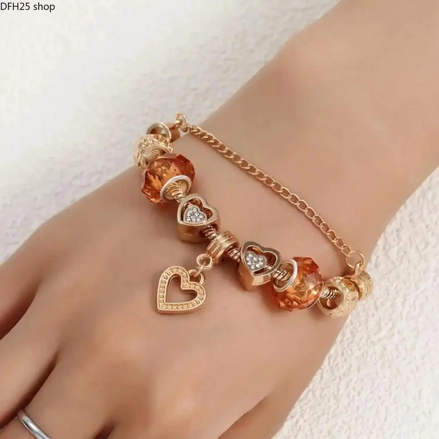 Heart Charm Bracelet for Women, Gold Tone Adjustable Chain with Hand Motif and Beaded Accents, Lightweight Jewelry for Daily Wear and Parties