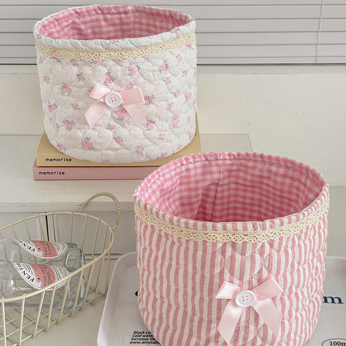 Cute lace bow patchwork storage basket, round fabric desktop organizer box, Instagram-style plaid print storage bin, soft padded makeup storage box, attractive pink bow storage bucket, foldable desktop storage basket